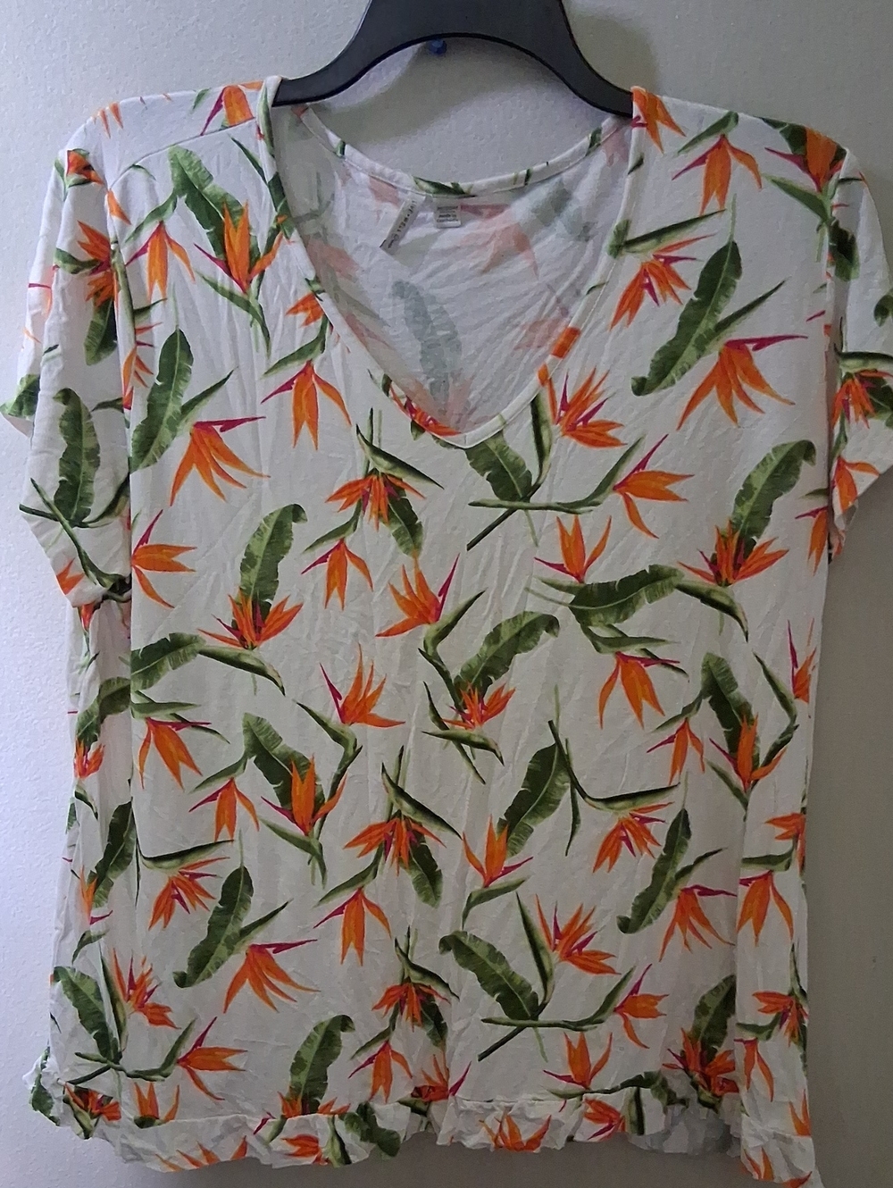 White V-Neck Tropical Print Top with Orange Floral Accents